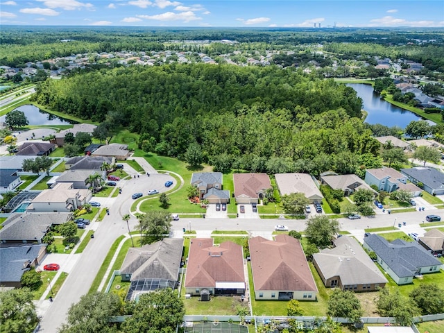 birds eye view of property featuring a residential view and a water view