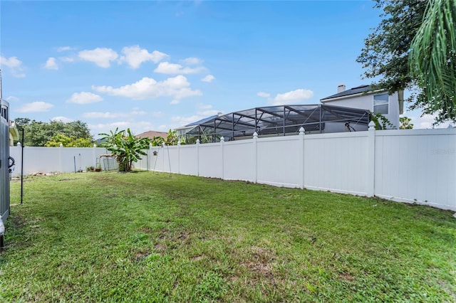 view of yard featuring a fenced backyard