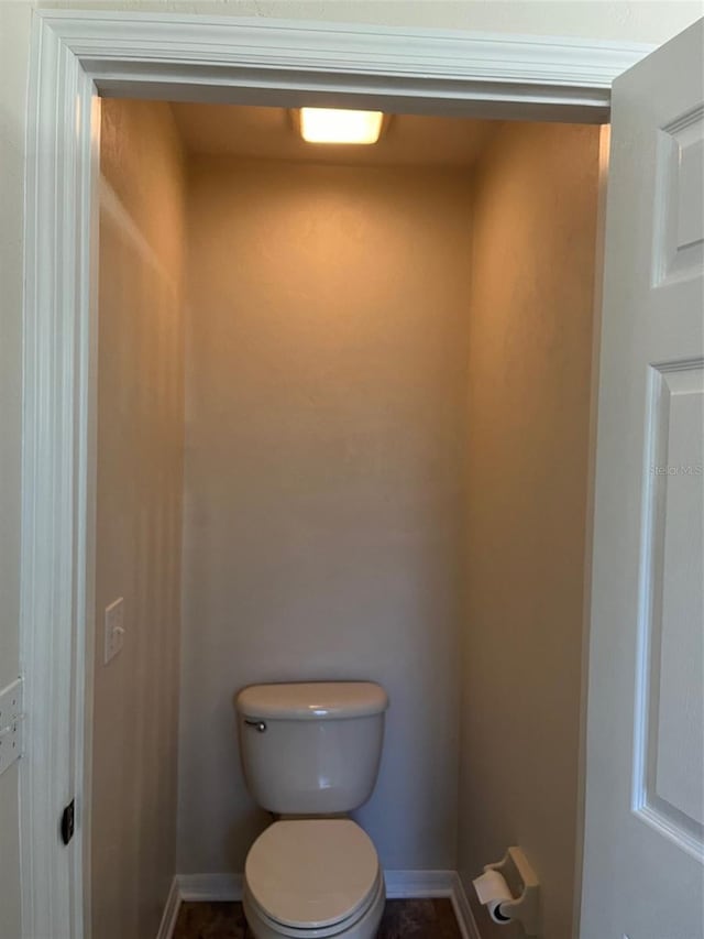 bathroom featuring toilet