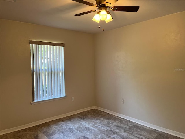 unfurnished room with ceiling fan