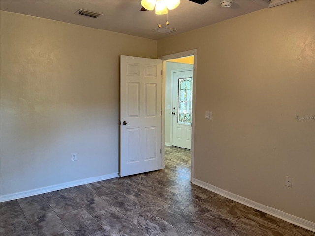 spare room featuring ceiling fan