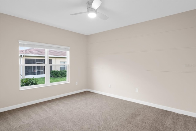 unfurnished room with carpet floors and ceiling fan