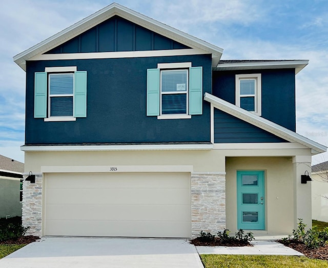 view of front of property with a garage