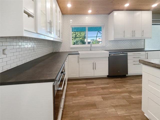 kitchen with wooden ceiling, hardwood / wood-style floors, white cabinets, and stainless steel dishwasher