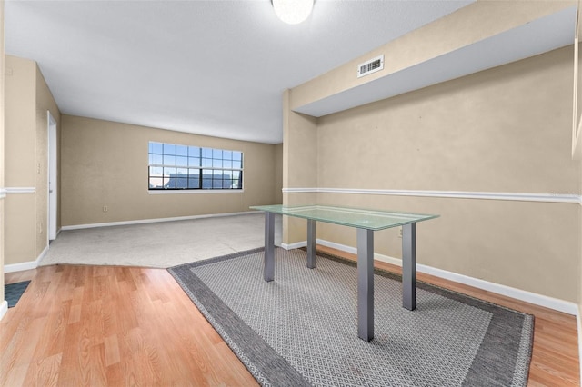 home office featuring hardwood / wood-style flooring