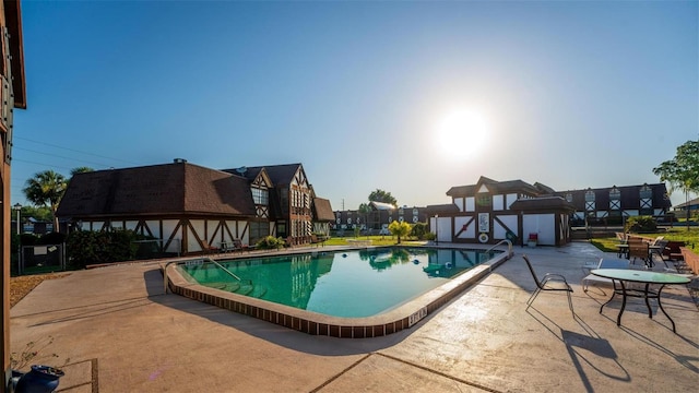 view of pool featuring a patio area