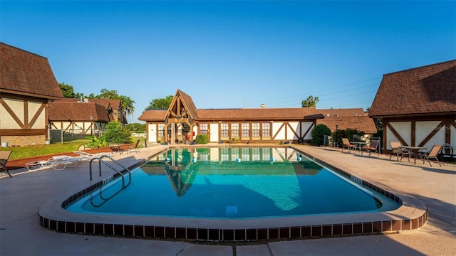 view of pool with a patio