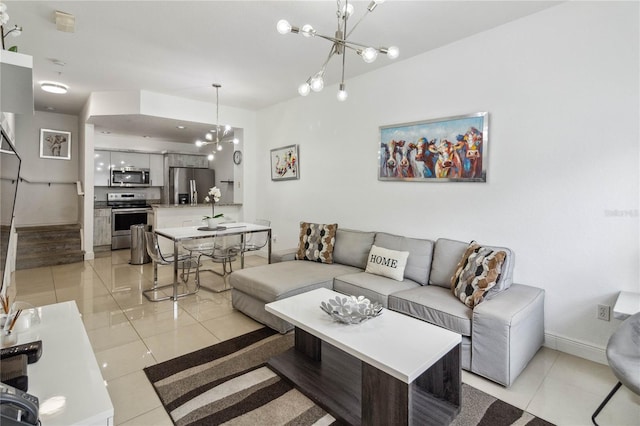 tiled living room featuring a notable chandelier