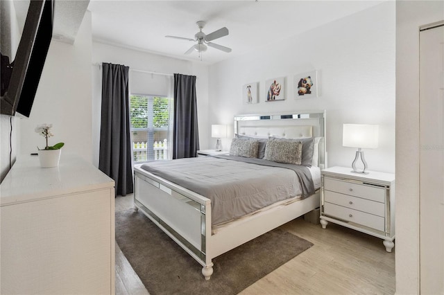 bedroom featuring ceiling fan and light hardwood / wood-style floors