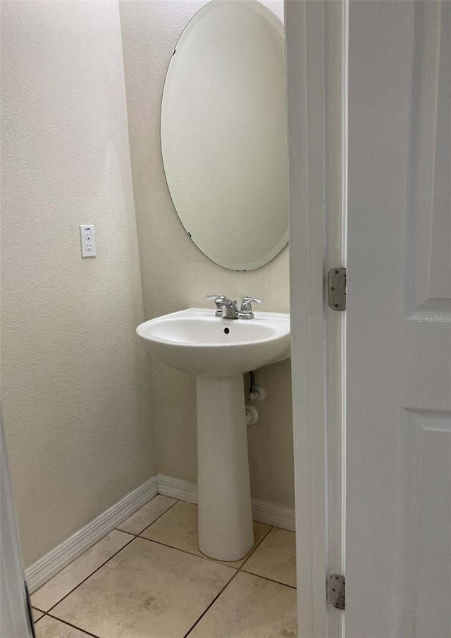 bathroom with tile floors