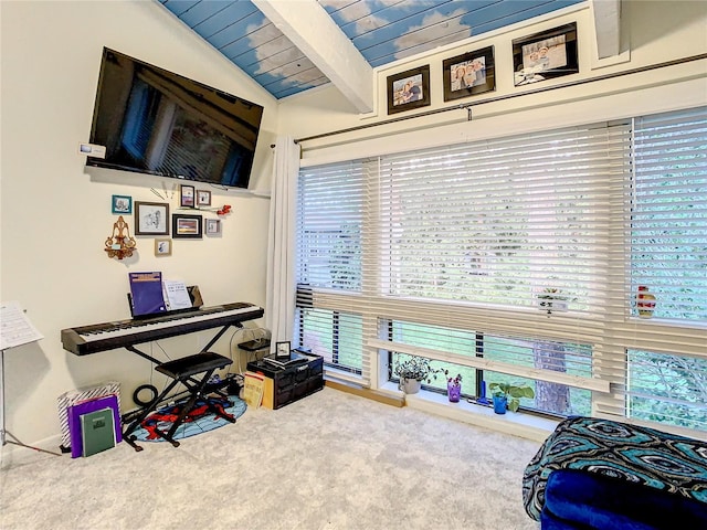 interior space with carpet flooring, lofted ceiling with beams, and wood ceiling