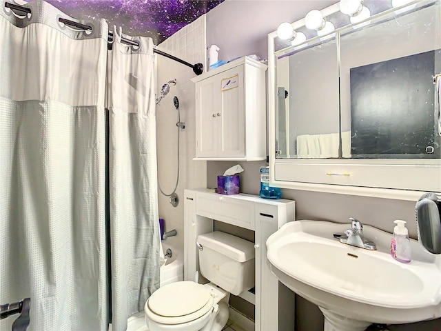 full bathroom featuring shower / bath combination with curtain, toilet, and sink