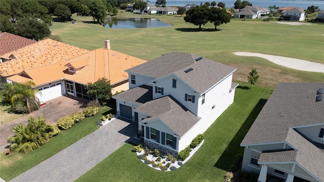 bird's eye view with a water view