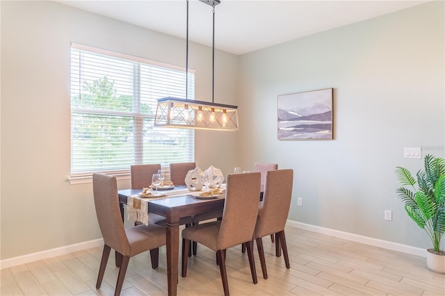 dining room featuring light hardwood / wood-style flooring