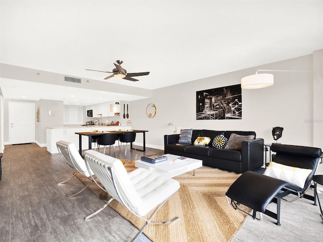 living room with ceiling fan