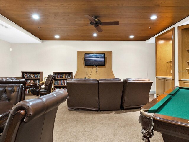 carpeted home theater room with ceiling fan, wooden ceiling, and pool table