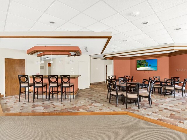 dining room featuring carpet flooring