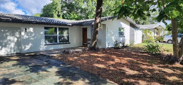 exterior space with a garage