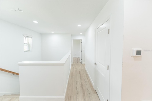 hallway featuring light wood-type flooring