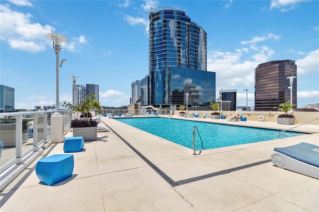 view of pool featuring a patio