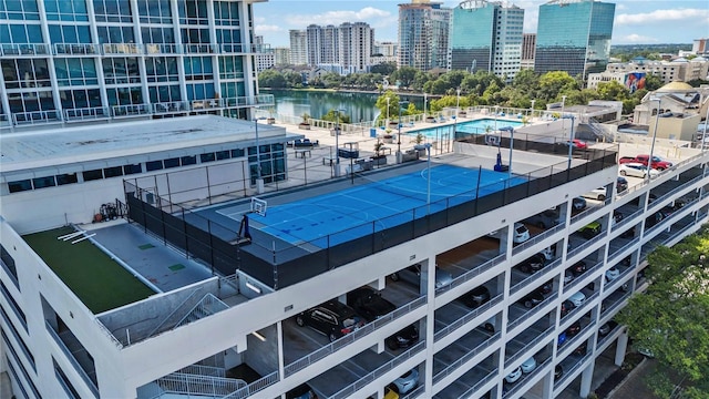 birds eye view of property with a water view