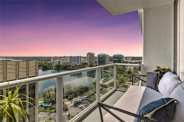 balcony at dusk with a water view