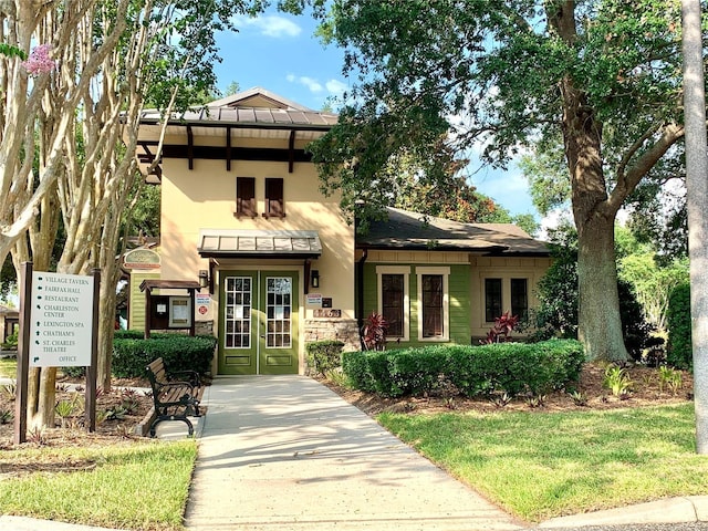 view of front of home featuring french doors