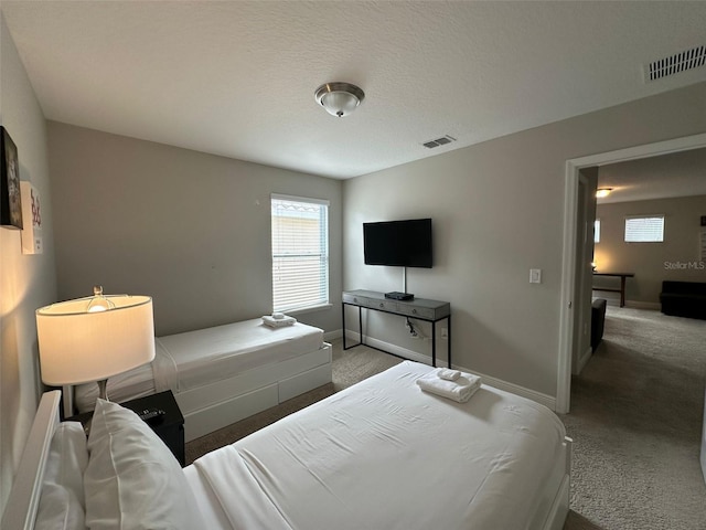 bedroom featuring carpet