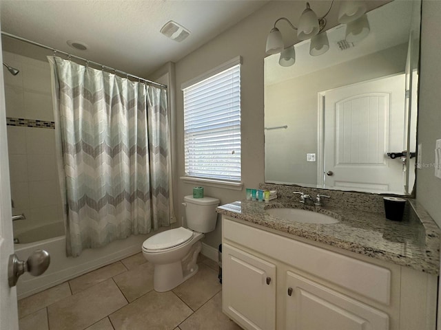 full bathroom with vanity, tile patterned floors, toilet, and shower / bath combo with shower curtain