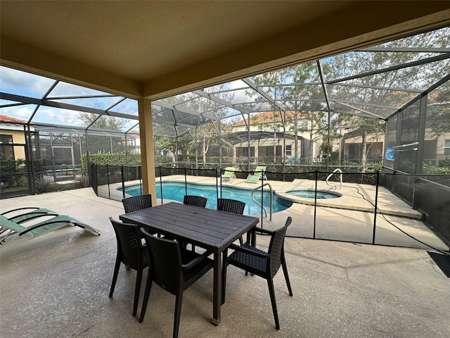 exterior space with a pool with hot tub and glass enclosure