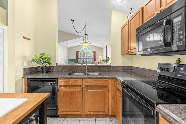 kitchen with vaulted ceiling, black appliances, light tile patterned floors, a textured ceiling, and sink