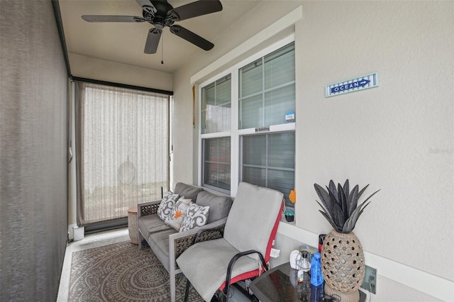 sunroom / solarium with ceiling fan