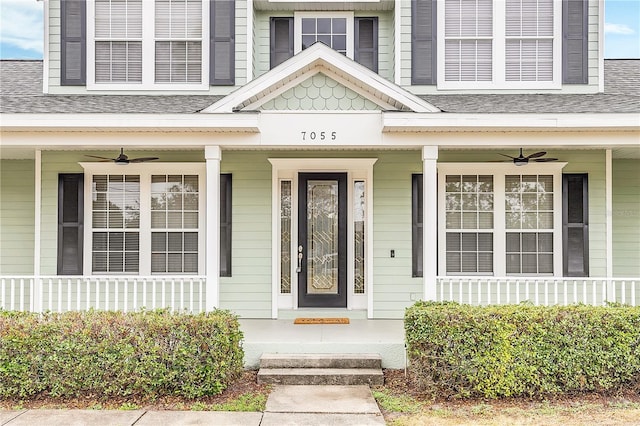 doorway to property with ceiling fan