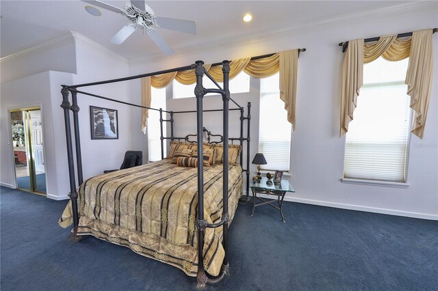 carpeted bedroom with multiple windows, ceiling fan, and crown molding