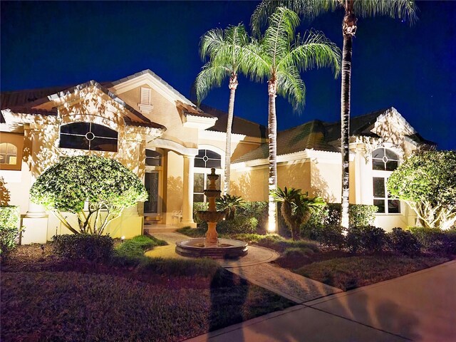 view of mediterranean / spanish-style house