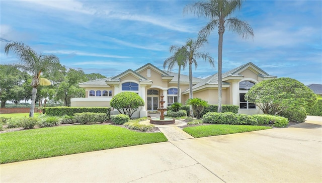 view of front of home with a front yard