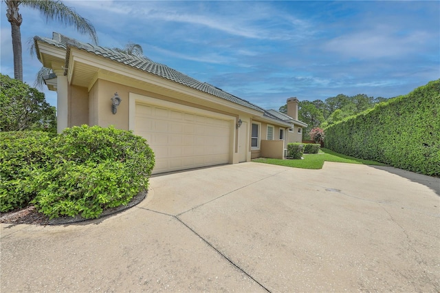 view of home's exterior featuring a garage