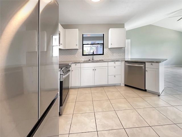 kitchen featuring white cabinetry, sink, and appliances with stainless steel finishes