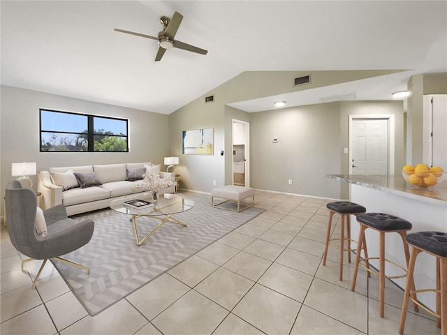 living room featuring light tile patterned floors, ceiling fan, and lofted ceiling