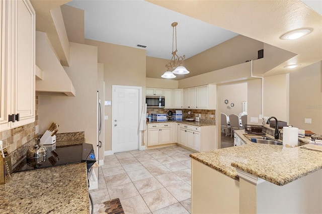 kitchen with stainless steel appliances, tasteful backsplash, sink, and extractor fan