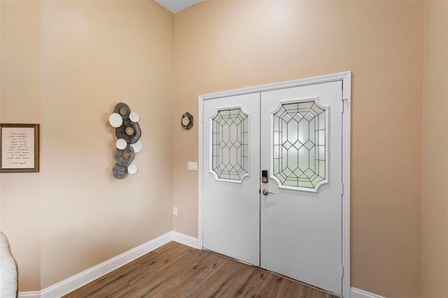 entrance foyer with hardwood / wood-style floors