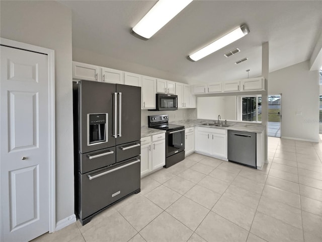 kitchen with white cabinets, light tile patterned floors, sink, and black appliances