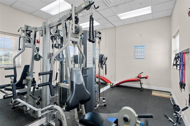 workout area with a drop ceiling