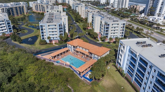 birds eye view of property with a water view