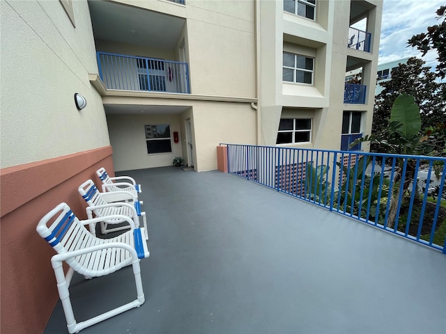 view of patio with a balcony