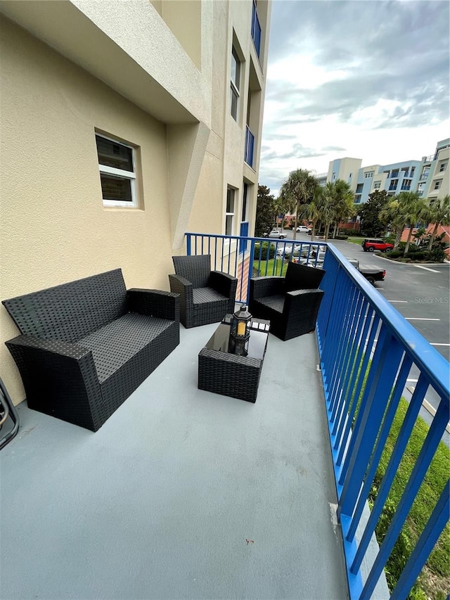 balcony with an outdoor hangout area