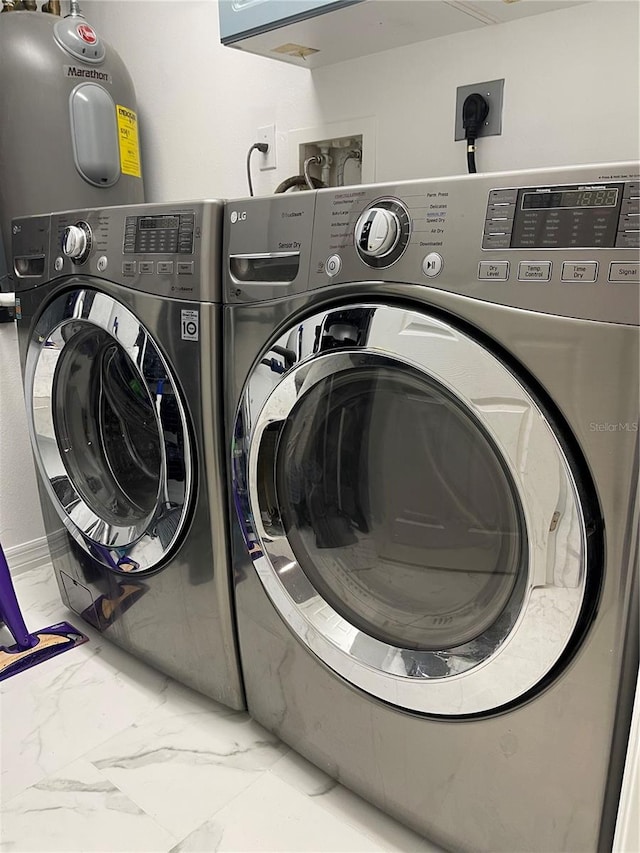 laundry area featuring independent washer and dryer