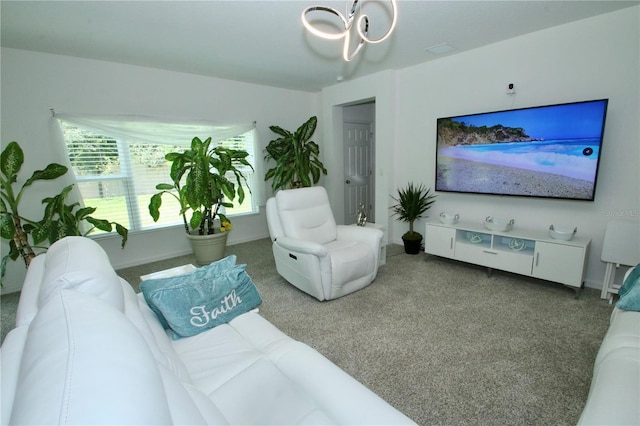 living room with carpet flooring and a notable chandelier