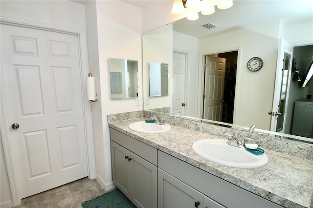 bathroom featuring vanity and tile patterned floors