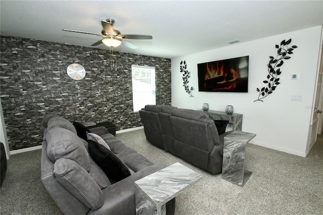 carpeted living room featuring ceiling fan